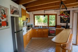 Kuchyň nebo kuchyňský kout v ubytování Le Grand Nid - Gîte La Maison Alvéole