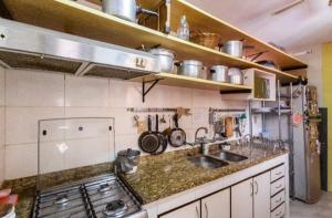 Η κουζίνα ή μικρή κουζίνα στο Hostel Espaço Grajaú