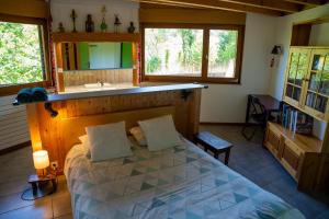 Postel nebo postele na pokoji v ubytování Le Grand Nid - Gîte La Maison Alvéole