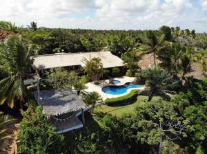 an aerial view of a resort with a swimming pool at Casa do Luar I Alagoas I Nordeste-Coruripe in Coruripe