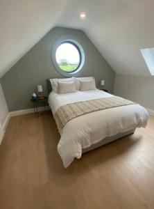 Voodi või voodid majutusasutuse Beyren House Guest Suite toas