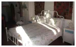 A bed or beds in a room at Vico Del Poeta