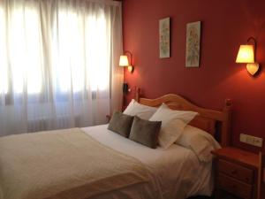 Posteľ alebo postele v izbe v ubytovaní Hotel La Bonaigua