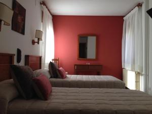 Posteľ alebo postele v izbe v ubytovaní Hotel La Bonaigua