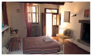A bed or beds in a room at Vico Del Poeta