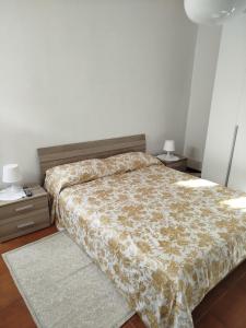 Postel nebo postele na pokoji v ubytování Casa Lilly