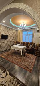 TV a/nebo společenská místnost v ubytování Gabala for the family