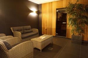 Posezení v ubytování Golden Tulip Ampt van Nijkerk