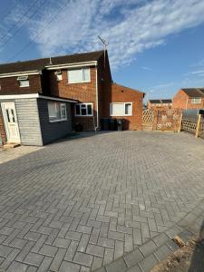 a brick driveway in front of a house at Amirs house reed ave in Kent