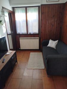 TV a/nebo společenská místnost v ubytování Casa Lilly + 14 fotografií
