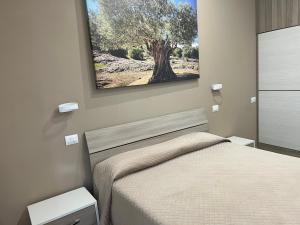 Postel nebo postele na pokoji v ubytování Il giardino di nunzia