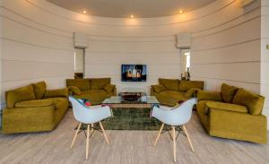 A seating area at Best Western Plus Hotel Farnese