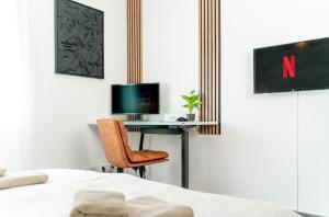 TV a/nebo společenská místnost v ubytování Barrierefreie Luxusoase I SnapLiving Apartments