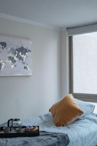 Una cama o camas en una habitación de Departamento en Las Condes Premium Parque Arauco con Aire Acondicionado 41 fotos más