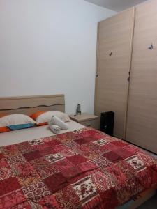 Ένα ή περισσότερα κρεβάτια σε δωμάτιο στο Punto FM