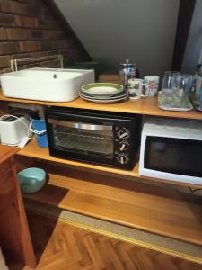 Η κουζίνα ή μικρή κουζίνα στο 4 Winds Farm Homestay +19 φωτογραφίες