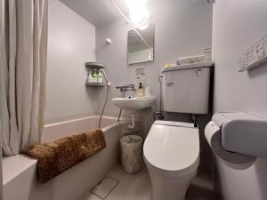Ванна кімната в Hotel Miki