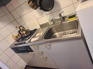 Η κουζίνα ή μικρή κουζίνα στο ホテルサンクリスター202