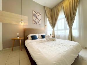 Postel nebo postele na pokoji v ubytování MesaHill Homestay, Nilai by S&T Homez + 37 fotografií