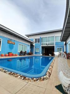 Swimmingpoolen hos eller tæt på Farsai Homestay
