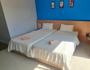 Postel nebo postele na pokoji v ubytování I Hotel Khonkaen
