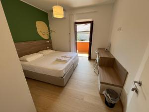 Katil atau katil-katil dalam bilik di Hotel Al Pescatore
