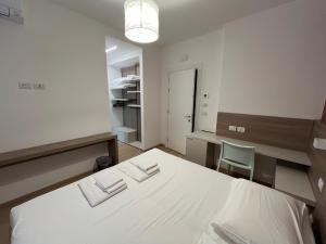 Katil atau katil-katil dalam bilik di Hotel Al Pescatore