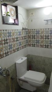Koupelna v ubytování Dion Homestay + 2 fotografie