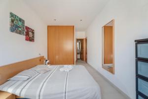 Postel nebo postele na pokoji v ubytování Casa Graham 14