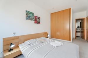 Postel nebo postele na pokoji v ubytování Casa Graham 14