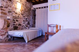 Cama o camas de una habitación en Agroturisme Sant Dionis