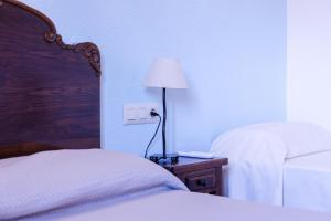 Cama o camas de una habitación en Agroturisme Sant Dionis