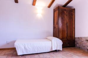 Cama o camas de una habitación en Agroturisme Sant Dionis
