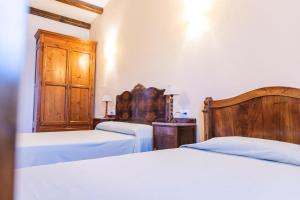 Cama o camas de una habitación en Agroturisme Sant Dionis