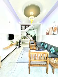 TV a/nebo společenská místnost v ubytování Homestay Green Quy Nhơn