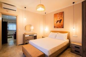 En eller flere senge i et værelse på Casa Del Paradiso