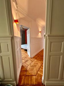 a hallway with a room with a bed in it at Nueva Pensión Real in Santander +51 photos