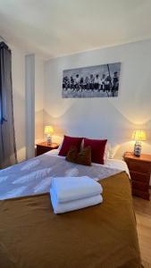 Postel nebo postele na pokoji v ubytování Apartments Madrid Suite Aeropuerto, IFEMA + 37 fotografií