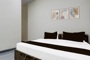 Postel nebo postele na pokoji v ubytování Super Hotel O Kalka