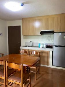 Kuchyň nebo kuchyňský kout v ubytování One Oasis Condotel by Dhebs + 16 fotografií