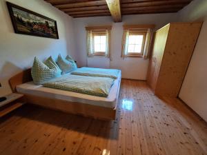 Postel nebo postele na pokoji v ubytování Ferienhaus Hinterhabneralm