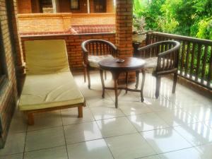 Balkón nebo terasa v ubytování Indraprastha Ubud Home Stay
