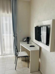 Kuchyň nebo kuchyňský kout v ubytování Hotel Maksim