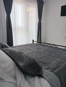 Katil atau katil-katil dalam bilik di Charlye 2 apartament