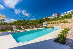 Swimmingpoolen hos eller tæt på Villa Carolea