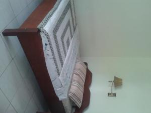 Postel nebo postele na pokoji v ubytování Indraprastha Ubud Home Stay