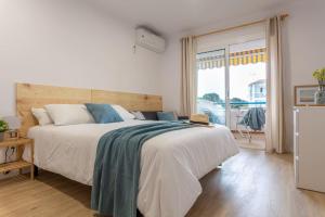 Ένα ή περισσότερα κρεβάτια σε δωμάτιο στο Estudio Blaumar