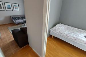 Postel nebo postele na pokoji v ubytování Spacious three room apartment with a large kitchen and bathroom