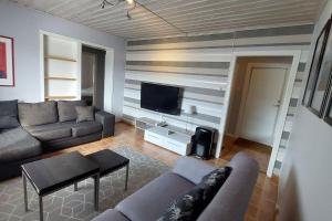 TV a/nebo společenská místnost v ubytování Spacious three room apartment with a large kitchen and bathroom