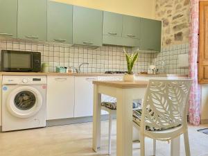Kuchyň nebo kuchyňský kout v ubytování Casa Nina - 10' dalla spiaggia